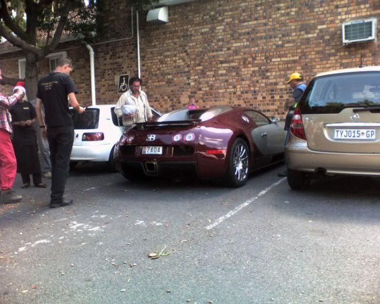 Anyway here's a comparison pic of a Bugatti next to a Toyota Tazz and 