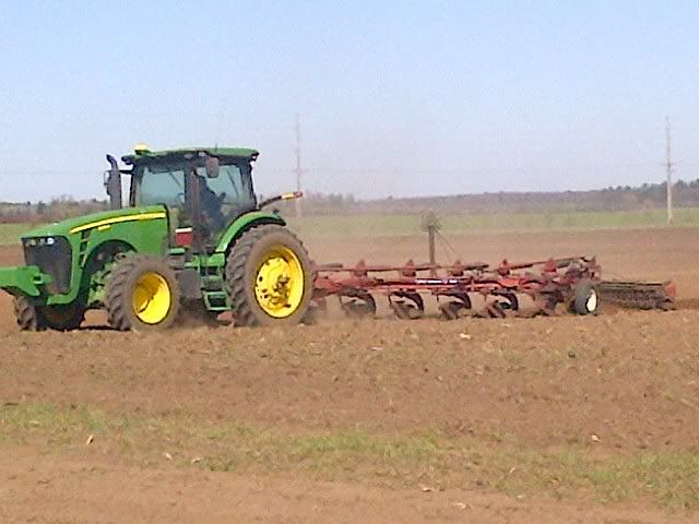Coloma Farms plowing ground ahead of time