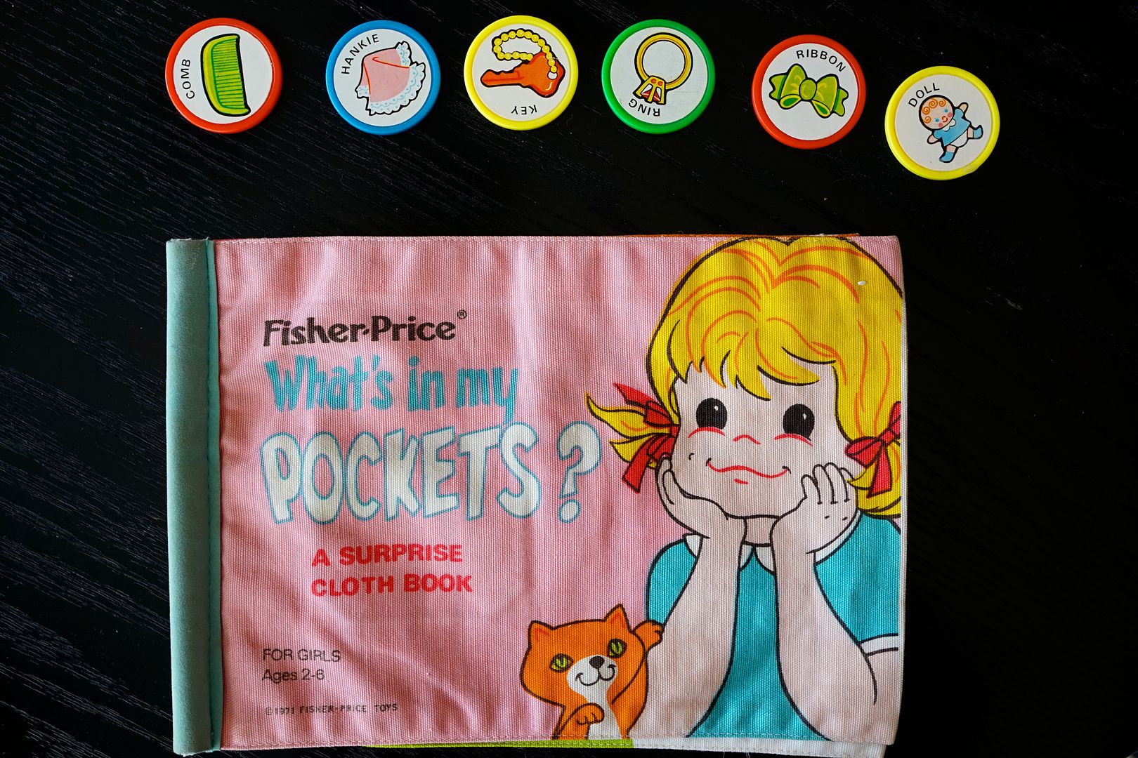 Anne S Odds And Ends Fisher Price Friday What S In My Pockets A Surprise Cloth Book