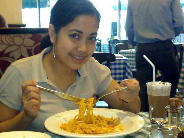 lady eating pasta
