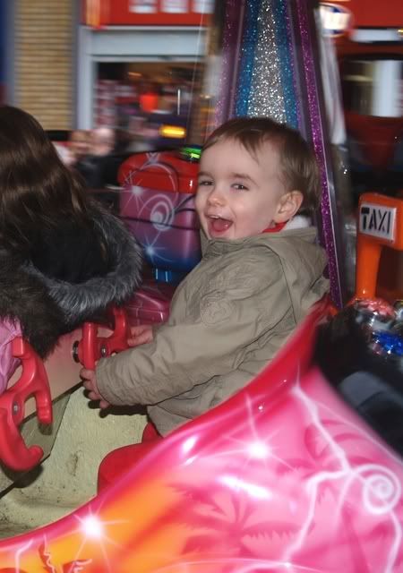 Connor on carousel in town 22 Dec 2008