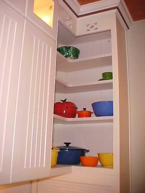 Le Creuset on corner shelf Pictures, Images and Photos