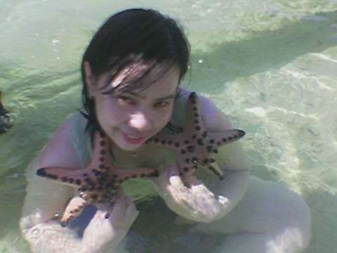 tita holding starfish