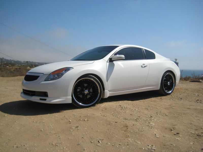 Nissan altima coupe white with black rims #2