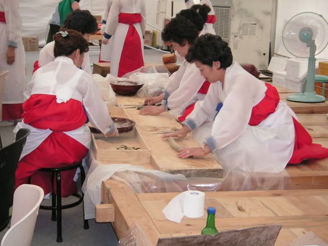 ladies making DOK, rice noodles