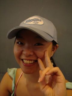 Miss Photogenic with a cap that made her less cute.. Thus the fingers..