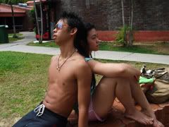 Tired and lazing in the sun but Siti was shouting 'squeeze those abs!'
