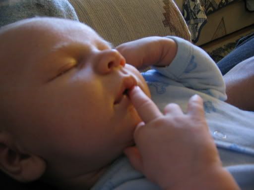 Mattias giving the finger in his sleep2.21.05