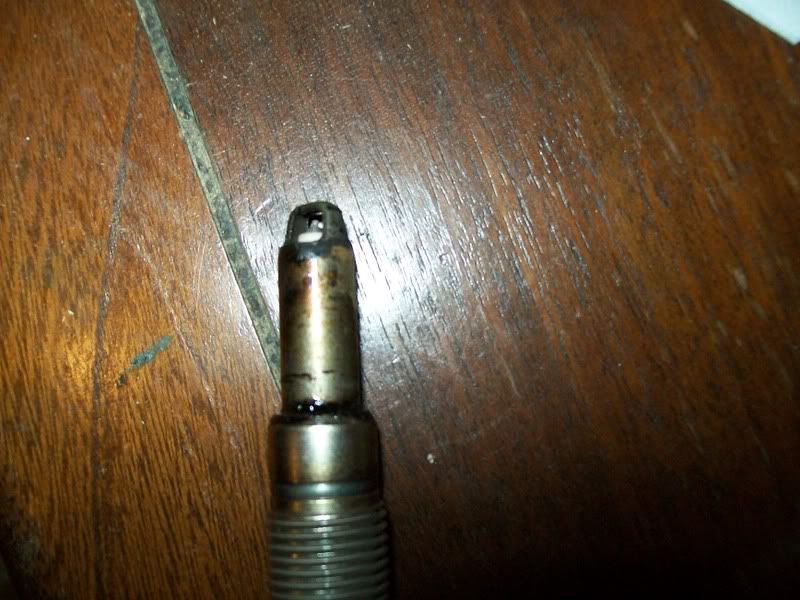 Black gunk on spark plug jacket. Ford Mustang Forum