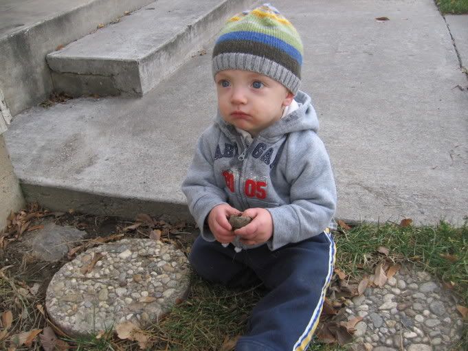 So i was remembering Tre as a baby and thougfht i would put some of my favorites up. He was such a peach! playing with something he found in the mud (moments later he ate some mud :) a true little boy)