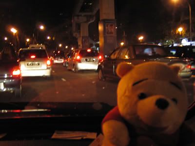 Pooh sitting in my sister car