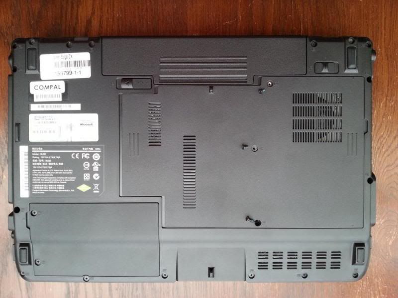 Base of Compal NBLB2 showing screws removed from main base plate