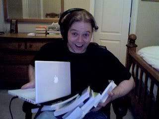 me with all my Spanish-learning books and my precious laptop and Sennheiser headphones