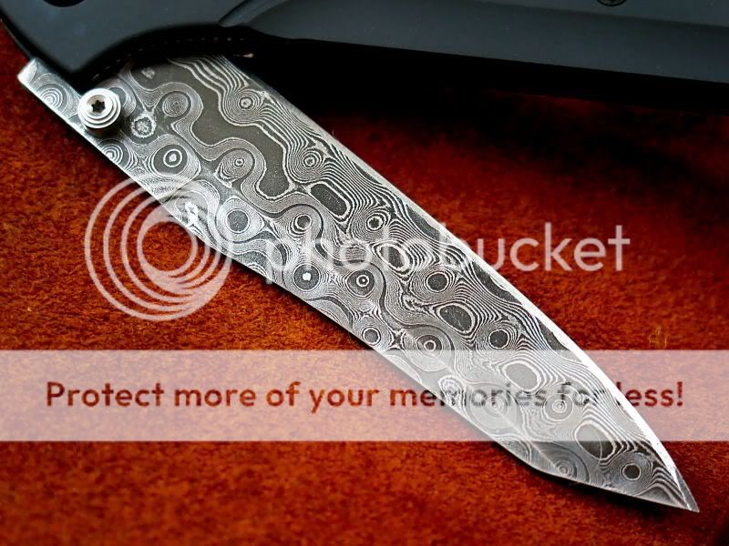 benchmade damascus steel droppoint knife