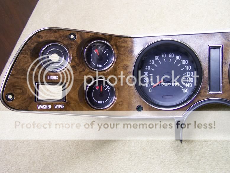 Woodgrain dash bezel restoration source?